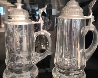 Repurposed Metal Art Tractor Sculpture and Assorted German Beer Steins