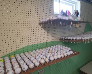 Golf balls with various business logos