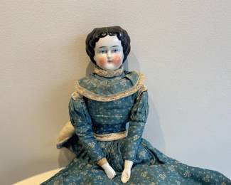 Porcelain bisque doll