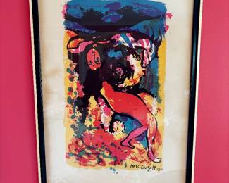 The image displays a framed, limited edition serigraph titled "Woman With Goat" by artist Marc Chagall, dated 1956.  It is a colorful modernist print featuring typical dream-like imagery. 