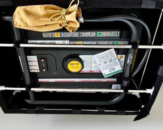 FIRMAN Generator runs on gasoline or propane- propane tank and stand available.  Storage cover and outdoor all weather cover as well.  Power supply cord.