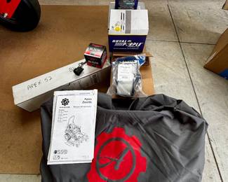 Additional supplies for zero turn mower blades, storage cover, etc