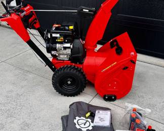Ariens 28" Snow Blower with additional supplies storage cover, oil, filters plugs etc