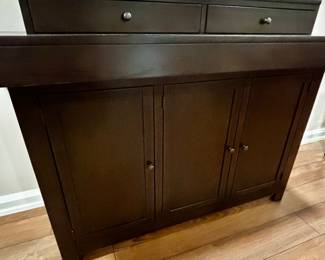 Free standing bar front with storage