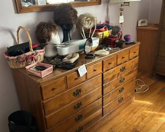 Dresser with wigs