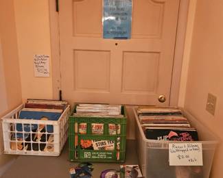 A collection of vinyl spanning decades, we have graded records wrapped in plastic individually priced We have a bin full of $2 records and other selections