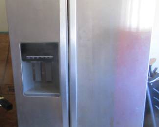 Two door stainless side by side. Works great, just moved in garage to make room for new one.