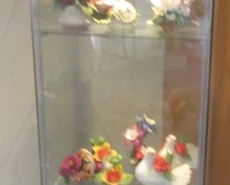 6 foot tall lighted glass display cabinet.