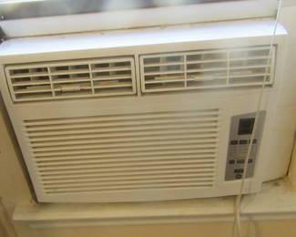 One of two working window air conditioners.