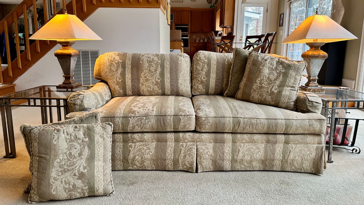 Sofa with matching pillows handcrafted in USA by Norwalk.