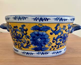 Asian porcelain footbath blue design on yellow.