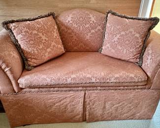 Camel back loveseat.