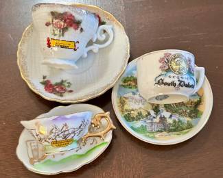 Miniature travel souvenir tea cups.