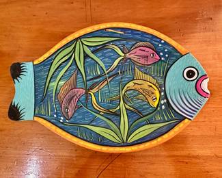 Hand painted fish on terra cotta.