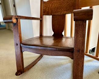 Antique Mission oak rocking chair.