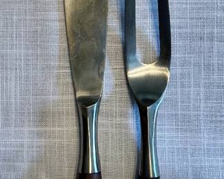 Teak and stainless steel carving set designed by Jens Quistgaard for Dansk.