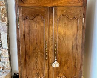 Antique 19th century French Provincial Louis XV style armoire.  Pegged construction.