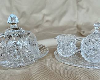 Vintage cut crystal butter dish, sugar and creamer set on tray.