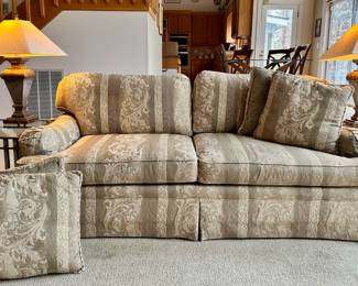 Sofa with matching pillows handcrafted in USA by Norwalk.