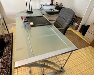 Metal and frosted glass corner desk.