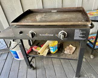 Two burner Blackstone griddle with cover.