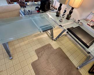 Metal and frosted glass corner desk.