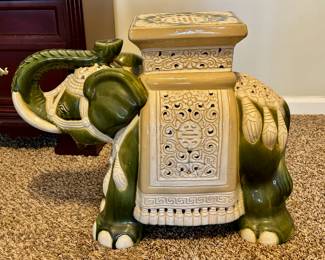 Glazed ceramic elephant garden stool.