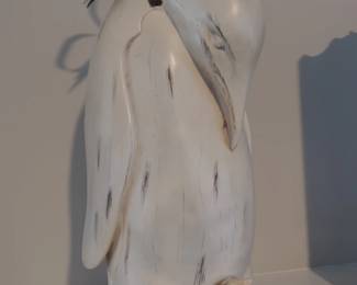 Wood penguin with chick