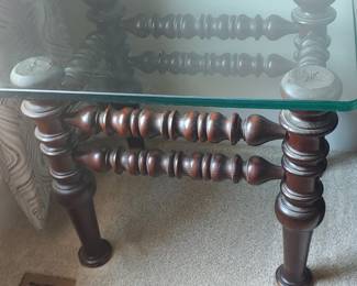 Thick glass top table with spool legs