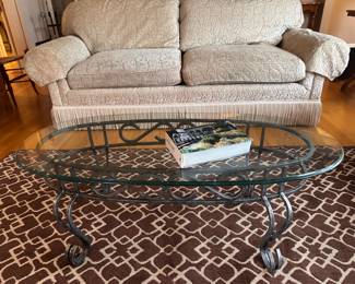 $60 Glass top metal base coffee table. 46"w x 22"d x 17"h.