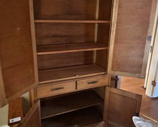 Inside of pine armoire.