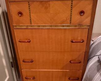 $760. Art deco waterfall 4 drawer chest with Bakelite handles from the 1930's. 30"w x 17"d x 47"h