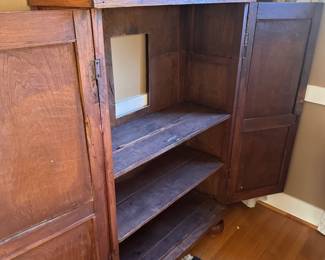 Interior of antique cabinet.