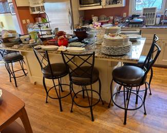 $220. Six swivel counter high bar stools by AHB.