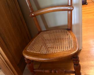 $80 Antique caned side chair. 17"w x 16"d x 33"h.