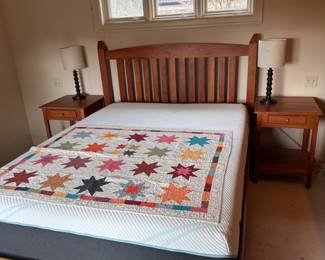 $780. Wood Queen bed with Mattress. 65.5"w x 87"d x 52"h.