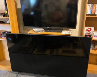 $ 100. 65" LG HDMI TV. Bottom TV. Samsung TV on top. $40