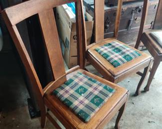 There are (4) matching chairs/ in the front living room.