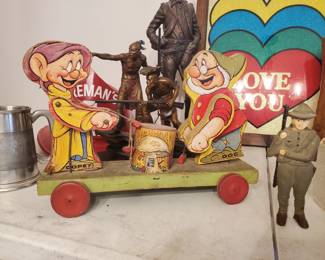 Disney's #770 pull toy and metal army figurine