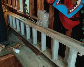 This ext ladder is almost as long as the garage, maybe 40'?