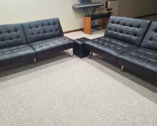 Two matching modern sofas