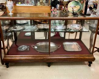 Antique English oak showcase 69.5” wide, 27” deep, 42” tall