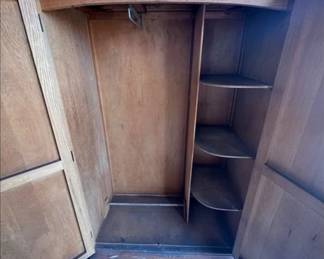Inside of one of two Art Deco wardrobes in this auction