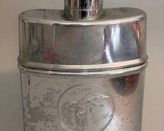 Whiskey flask with flying duck motif