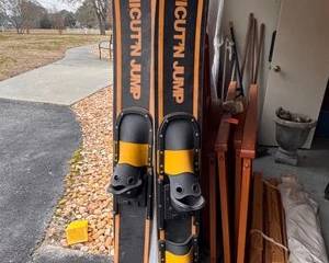 Pair of vintage Cu'tN Jump water skis