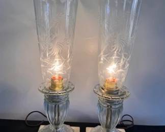 Pair of vintage torchiere lamps with a marble bases and etched globes