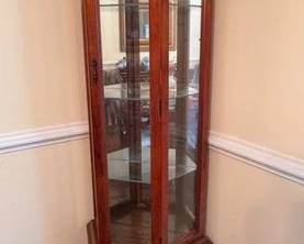 Curio cabinet with glass shelves