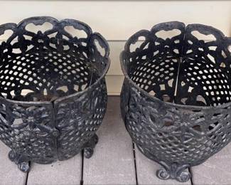 Pair of footed cast iron planters