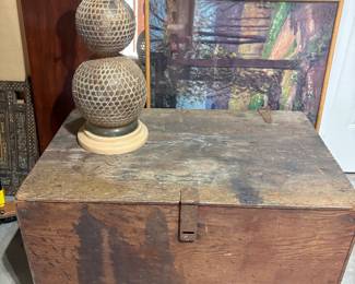 Old wooden trunk, antique lamp