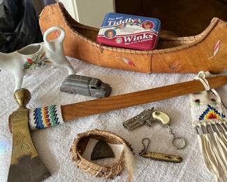 Birch bark canoe, wooden beaded pipe with ax head/smoking bowl